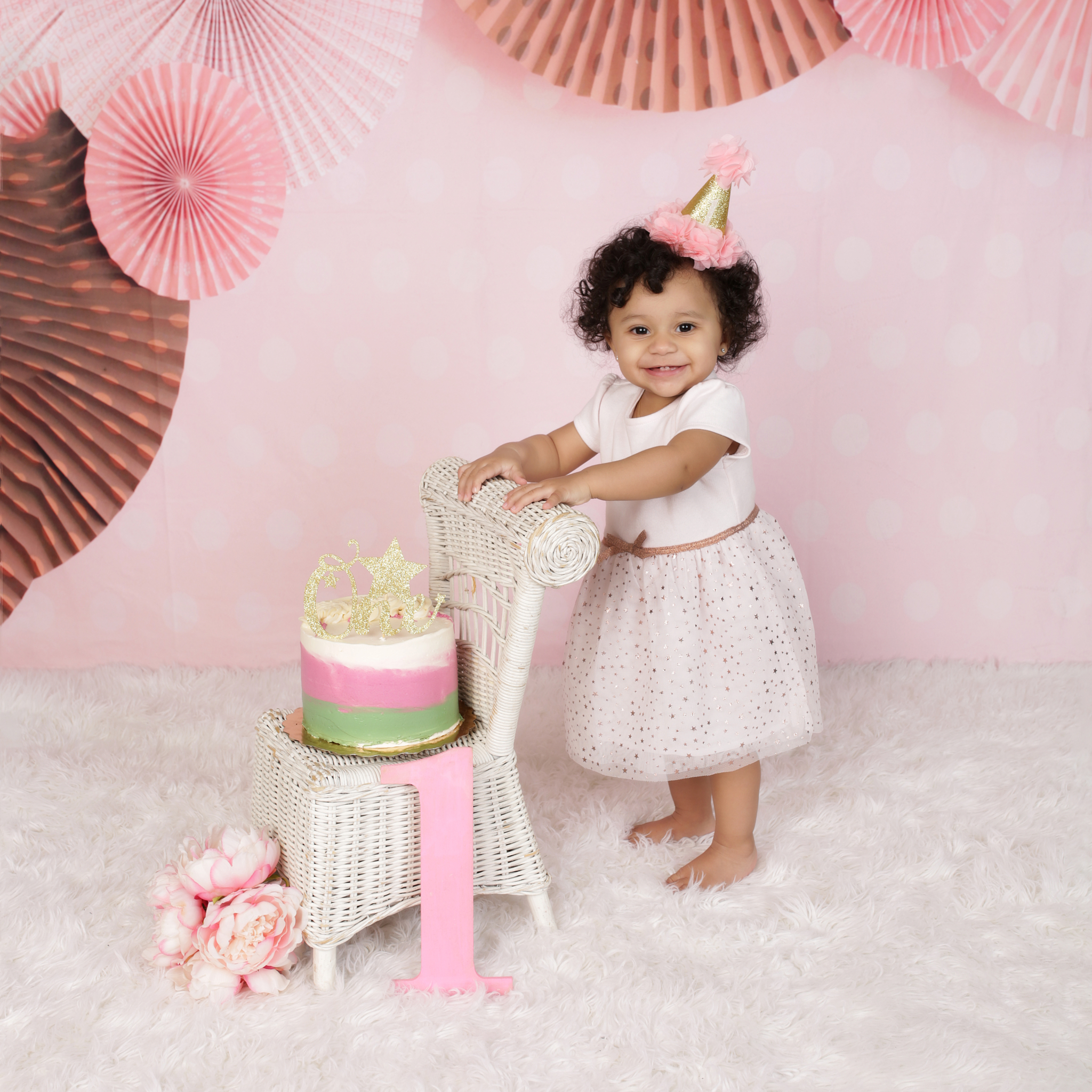 Pink w/Circle Fans and White Wicker Chair & Flowers